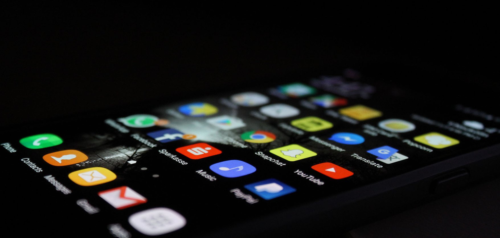 A mobile phone showing a number of apps